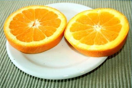 Hvordan øke frukt yield på appelsintrær. To måter å øke utbyttet.